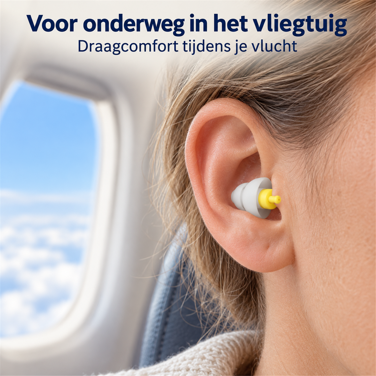 Vliegtuig-oordopje gedragen in het oor tijdens een vlucht